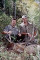 Bow hunter John Arnold with 6x6 bull elk