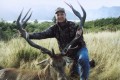 Rich Pendalton with 310 SCI Red Stag in Otago