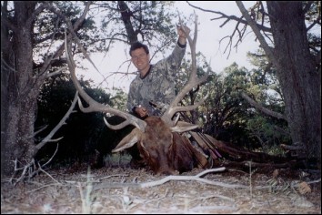 Outfitter/head guide with 6x6 322 Pope & Young archery Elk